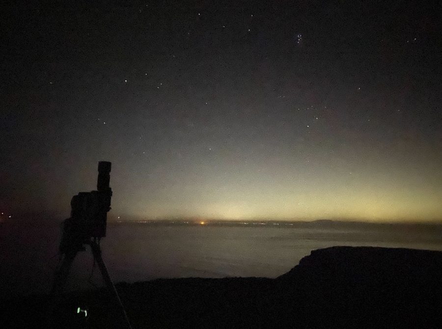 Night sky-glow measurement with a spectrometer on a coastal ridge