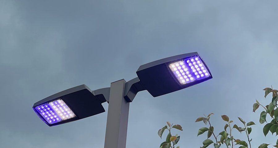 Roadway LED fixture showing blue-shift failure from phosphor degradation